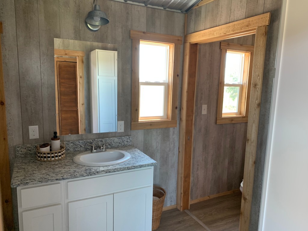 The Jack and Jill bathroom feautres 36" doors.